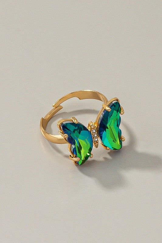 Butterfly ring with adjustable brass band