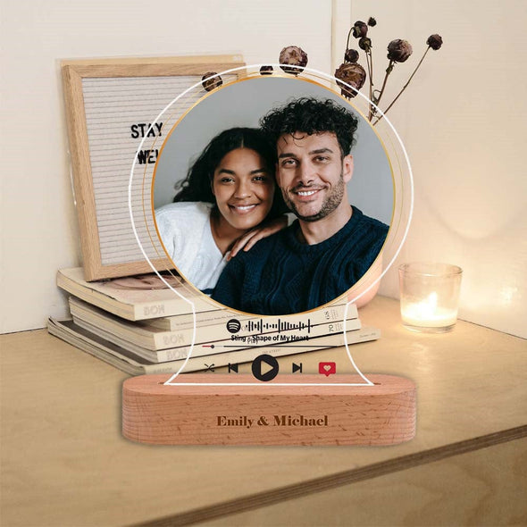 Create an illuminated memento - personalize it with your special photo & song!