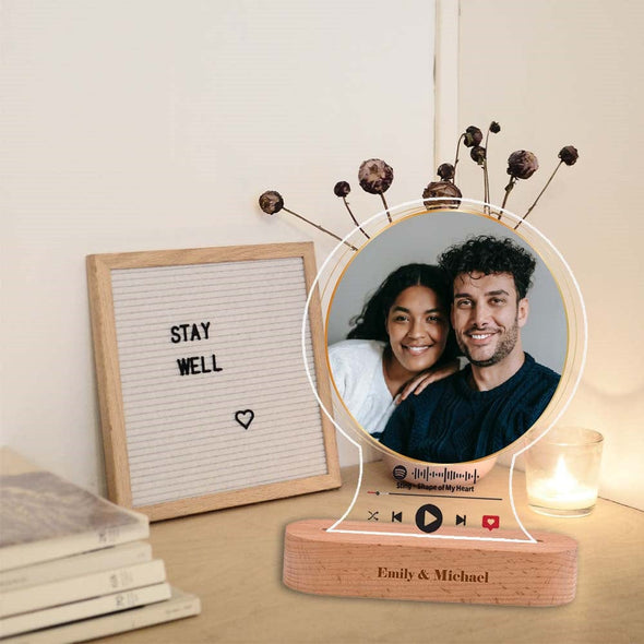 Create an illuminated memento - personalize it with your special photo & song!